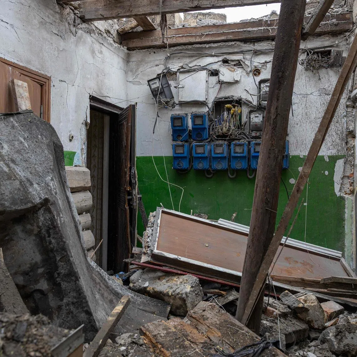 Debris in a hallway of a damaged residential building following a Russian overnight drone attack in Odesa on Feb 4, amid the Russian invasion of Ukraine.