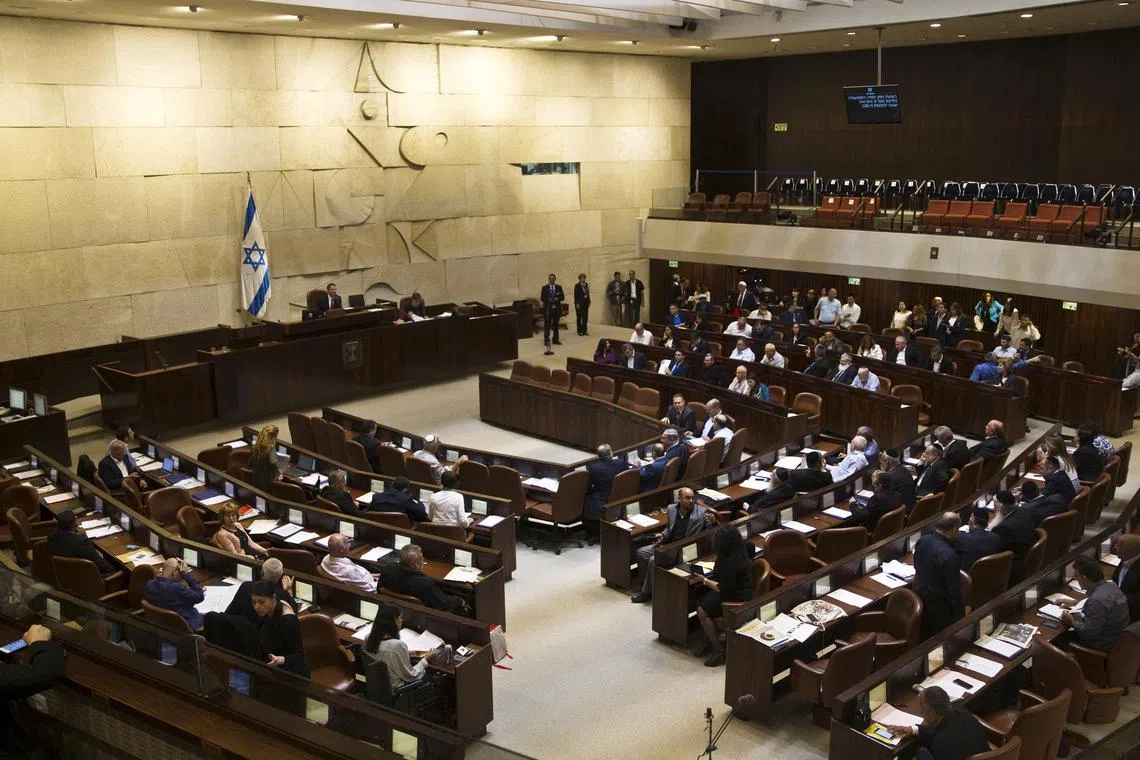 FILE PHOTO: A general view shows the plenum during a session at the Knesset, the Israeli parliament, in Jerusalem May 13, 2015. REUTERS/Ronen Zvulun/File Photo