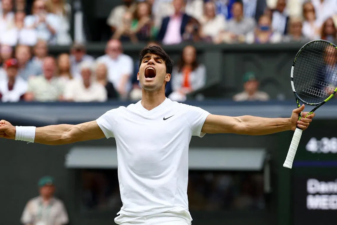 Tennis - Wimbledon - All England Lawn Tennis and Croquet Club, London, Britain - July 12, 2024  Spain's Carlos Alcaraz celebrates after winning his semi final match against Russia's Daniil Medvedev REUTERS/Matthew Childs