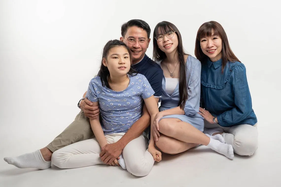amsibling - (L to R): Sisters Grace Tan, 14, and Sarah Tan, 17, with their parents, Alex Tan and Mary Lee Credit: Courtesy of Mary Lee