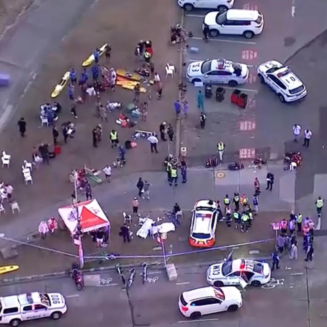 Emergency personnel working at the scene of a shooting incident at Bondi Beach in Sydney on Dec 14.