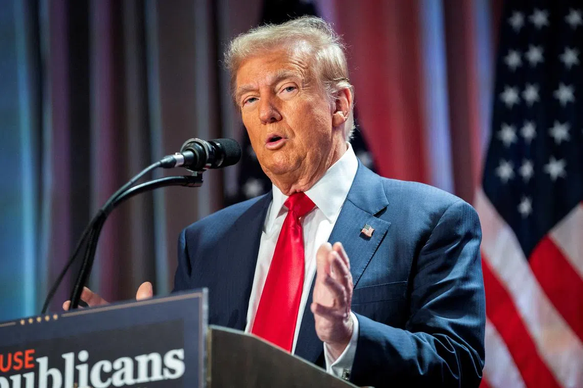 FILE PHOTO: US President-elect Donald Trump speaks during a meeting with House Republicans at the Hyatt Regency hotel in Washington, DC, U.S. on November 13, 2024.     ALLISON ROBBERT/Pool via REUTERS/File Photo