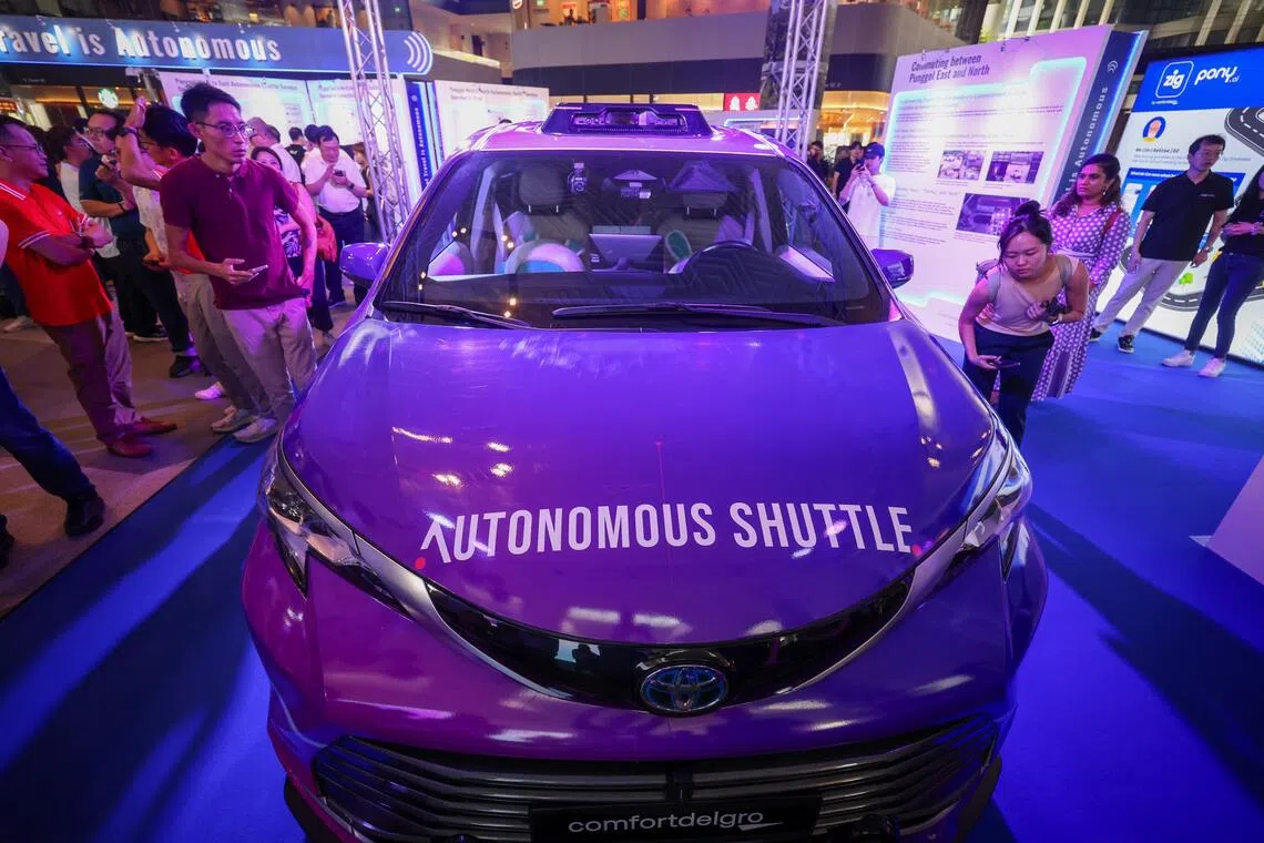 A self-driving shuttle at a public roadshow at Punggol Digital District on Sept 20.