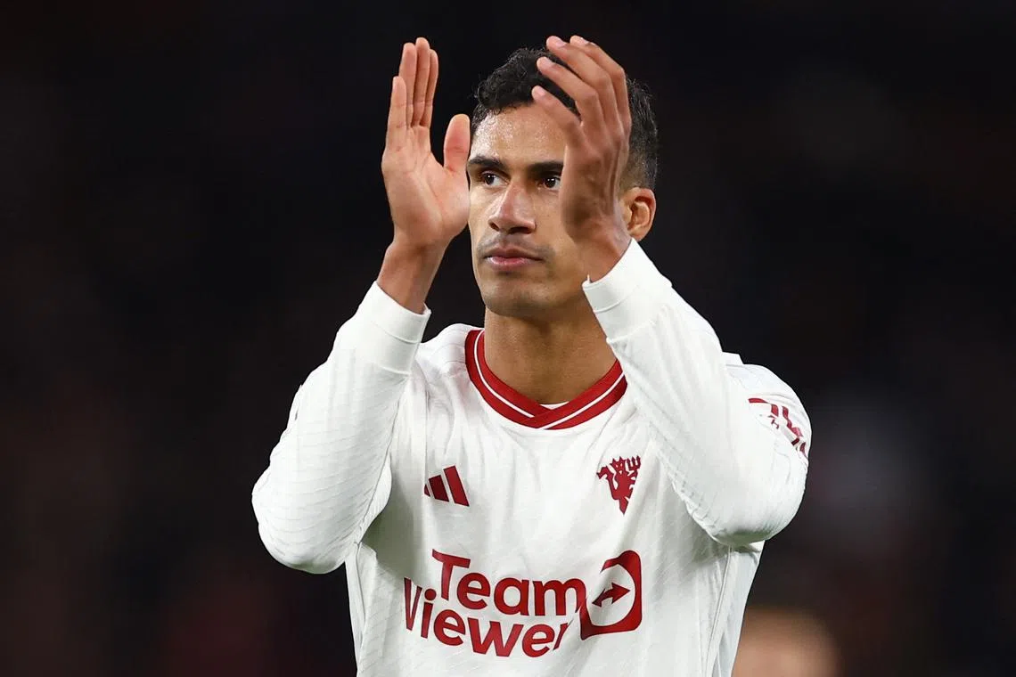 FILE PHOTO: Soccer Football - Premier League - Liverpool v Manchester United - Anfield, Liverpool, Britain - December 17, 2023 Manchester United's Raphael Varane reacts after the match REUTERS/Molly Darlington