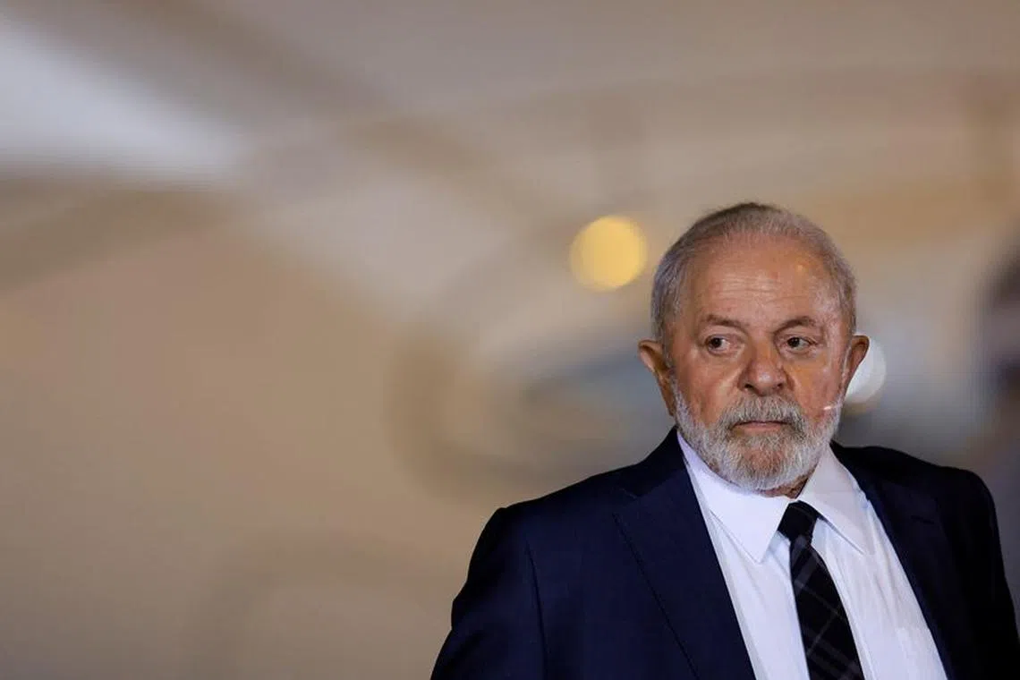 Brazil's President Luiz Inacio Lula da Silva reacts after meeting with Brazilian citizens, who were repatriated from the Gaza Strip, upon arrival at the Air Force base of Brasilia, Brazil November 13, 2023. REUTERS/Ueslei Marcelino