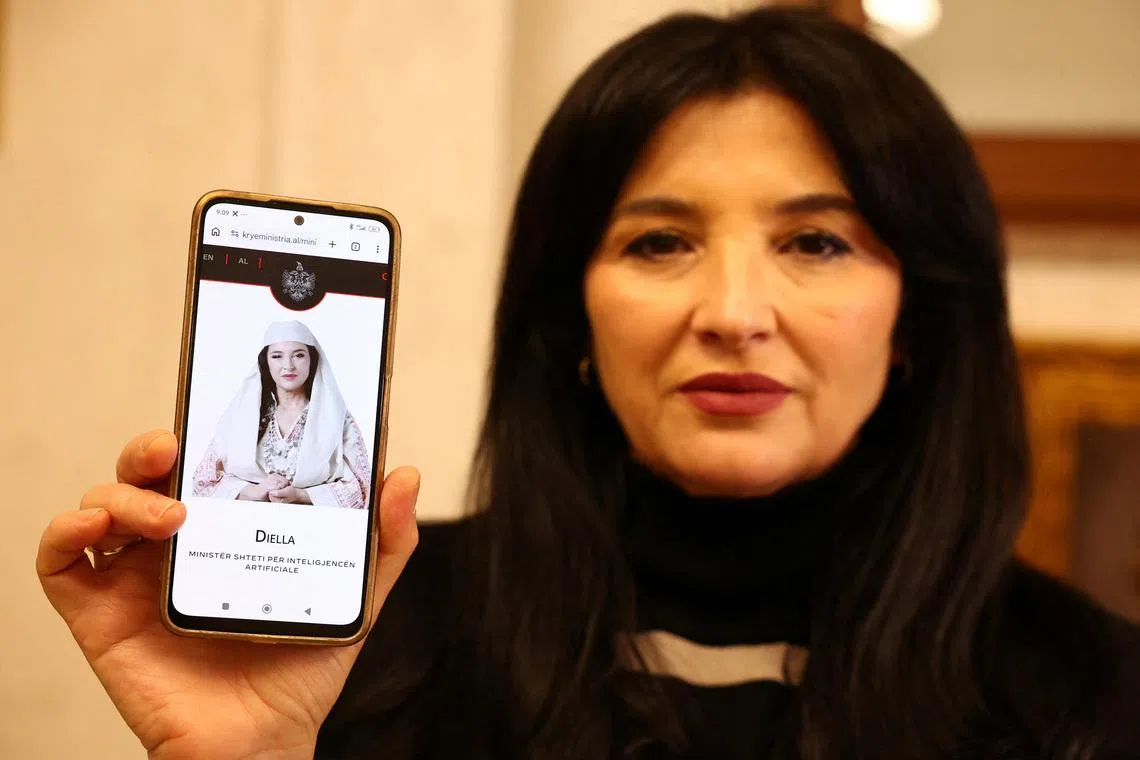Albanian actor Anila Bisha, who is suing the government, claiming officials unlawfully used her face and voice to create an AI chatbot named Diella, presented as a \"virtual minister\", shows her phone displaying a govermental website, in Tirana, Albania, on February 12, 2026. REUTERS/Florion Goga