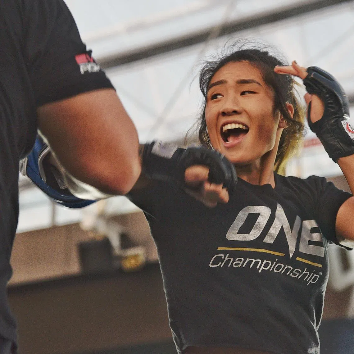 Angela Lee seen at OCBC Square at Sports Hub on 24 March 2022 during the Open workout ahead of mixed martial arts event One Championship X.