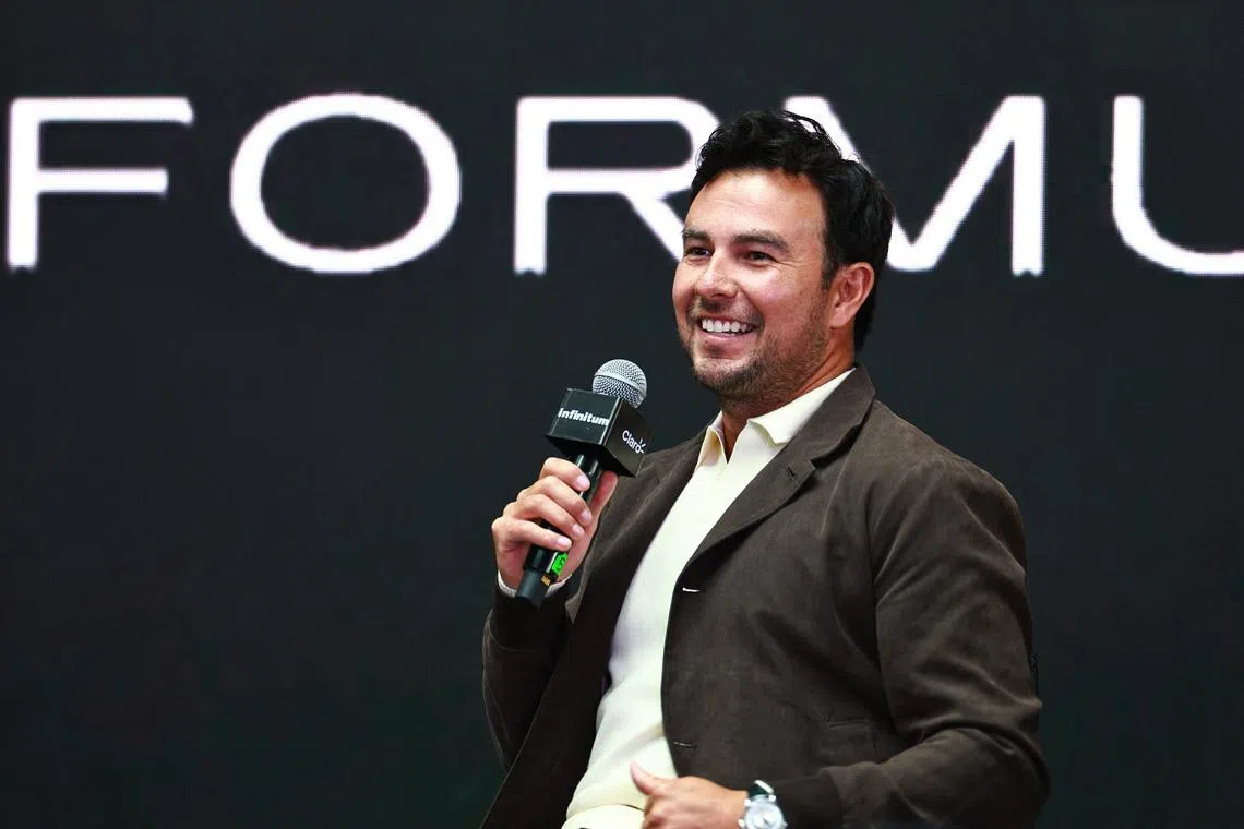 FILE PHOTO: Formula One F1 - Mexican F1 driver Sergio Perez to speak to media after announcing his Cadillac team signing - Plaza Carso, Mexico City - August 27, 2025 Formula One driver Sergio Perez during the event announcing his signing with the new Cadillac Formula One team for the 2026 season REUTERS/Eloisa Sanchez/File Photo