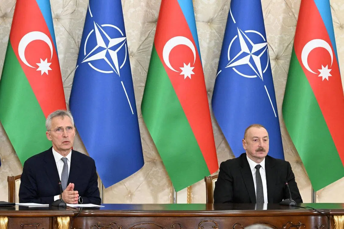 Azerbaijani President Ilham Aliyev and NATO Secretary General Jens Stoltenberg deliver press statements following their talks in Baku on March 17, 2024. The NATO chair is on a visit to Armenia, Azerbaijan, and Georgia. (Photo by Handout / Azerbaijani presidency / AFP) / RESTRICTED TO EDITORIAL USE - MANDATORY CREDIT "AFP PHOTO / Azerbaijani presidency / handout" - NO MARKETING NO ADVERTISING CAMPAIGNS - DISTRIBUTED AS A SERVICE TO CLIENTS