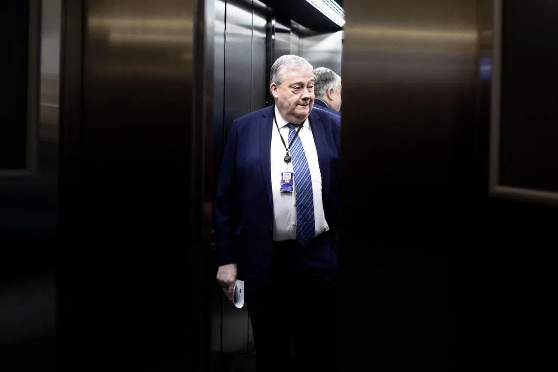 (FILES) In this file photo taken on February 2, 2023 Belgian Euro Deputy Marc Tarabella takes an elevator as he leaves after a vote on a request for waiver of his immunity and Italian fellow lawmaker Andrea Cozzolino's as part of a probe into alleged bribery by Qatar and Morocco during a session at EU Parliament in Brussels. - Belgian MEP Marc Tarabella was charged with "corruption" and remanded in custody on February 11, 2023 in the investigation into suspected interference by Qatar and Morocco in the decisions of the European Parliament, the Federal Prosecutor's Office announced. (Photo by Kenzo TRIBOUILLARD / AFP)