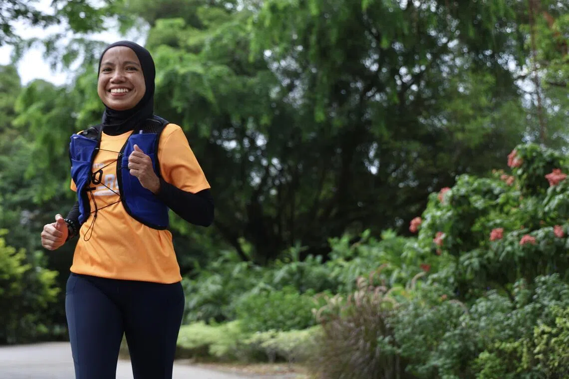 Ultramarathoner Martini Abdul Talib, 43, had never been sporty as a child. She started running in 2012 to lose weight after delivering her third child. 
ST Photo: Hester Tan