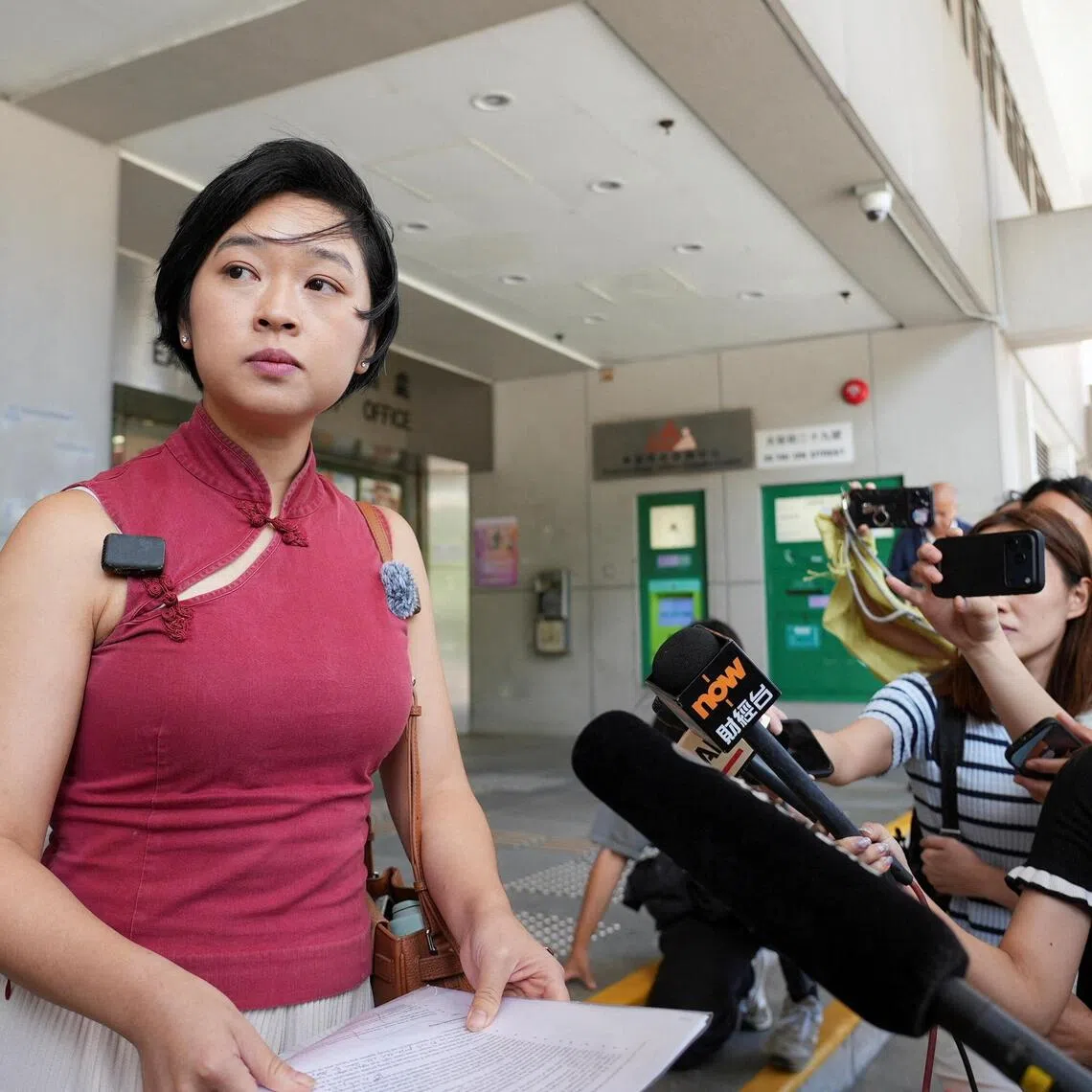 Former Wall Street Journal journalist Selina Cheng speaking to reporters outside the courts in Hong Kong on Sept 10.