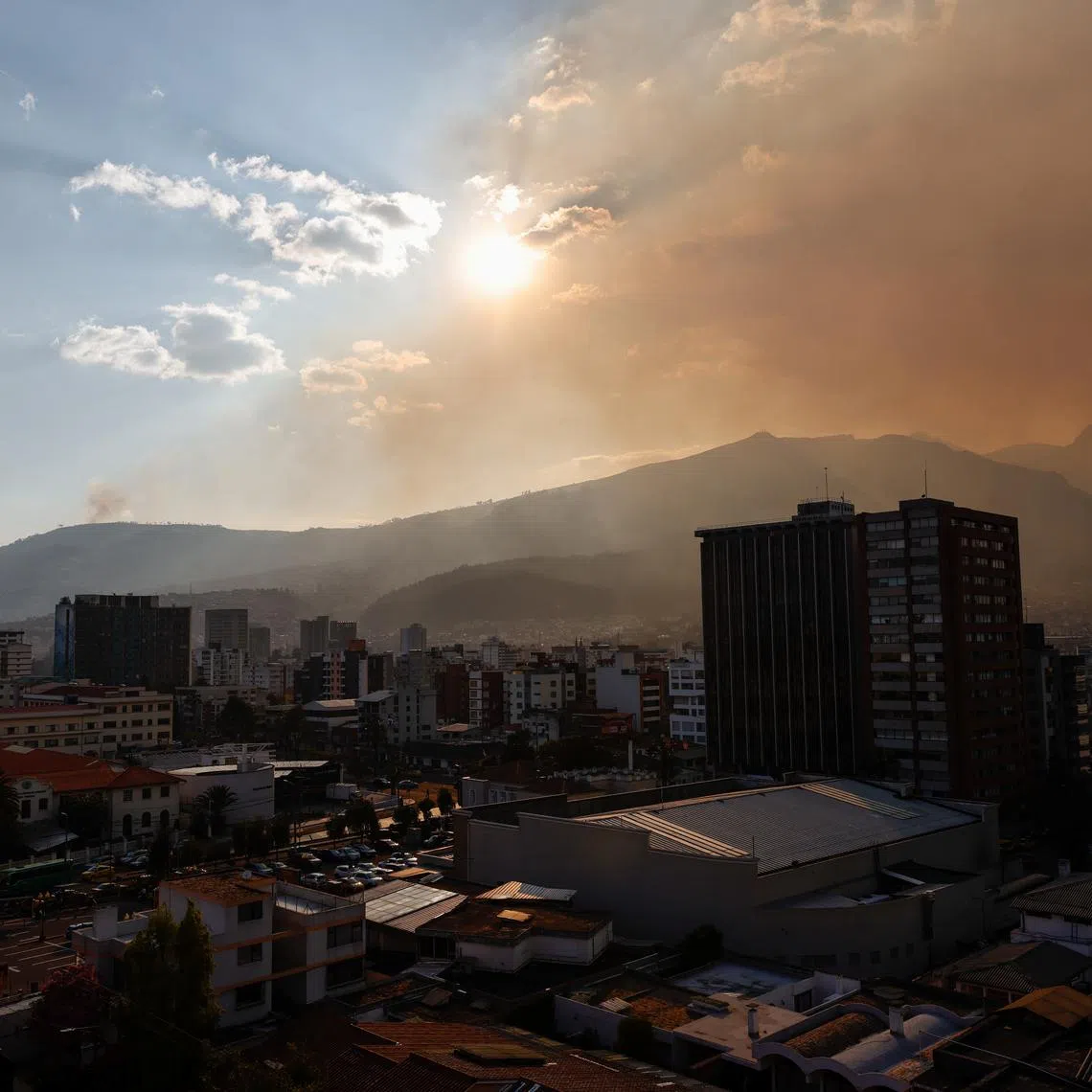 FILE PHOTO: A cloud of smoke and ash is seen covering Quito, as the city has five active fires in its surroundings, Ecuador September 4, 2024. REUTERS/Karen Toro/File Photo