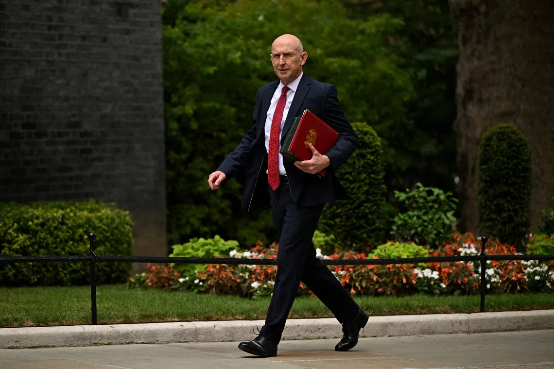British Finance Minister Healey walks fiscal tightrope before first budget