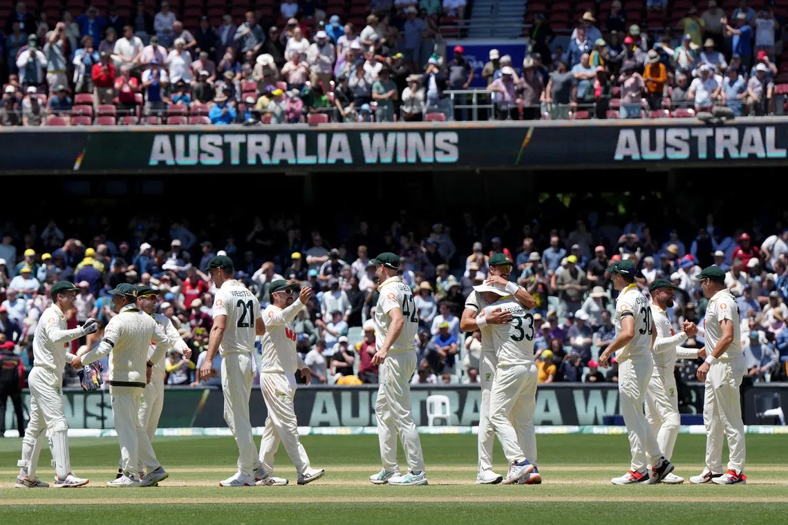 Cricket - The Ashes - Australia v England - Third Test - Adelaide Oval, Adelaide, Australia - December 21, 2025 Australia players celebrate winning the match and retaining the Ashes REUTERS/Asanka Brendon Ratnayake
