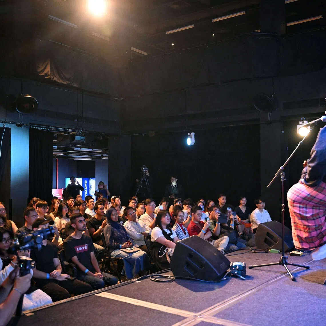 The Straits Times' Music Lab podcast, hosted by ST music correspondent Eddino Abdul Hadi, featuring rapper Abangsapau and indie-pop singer-songwriter Regina Song at Esplanade Annexe Studio on Oct 7, 2025.