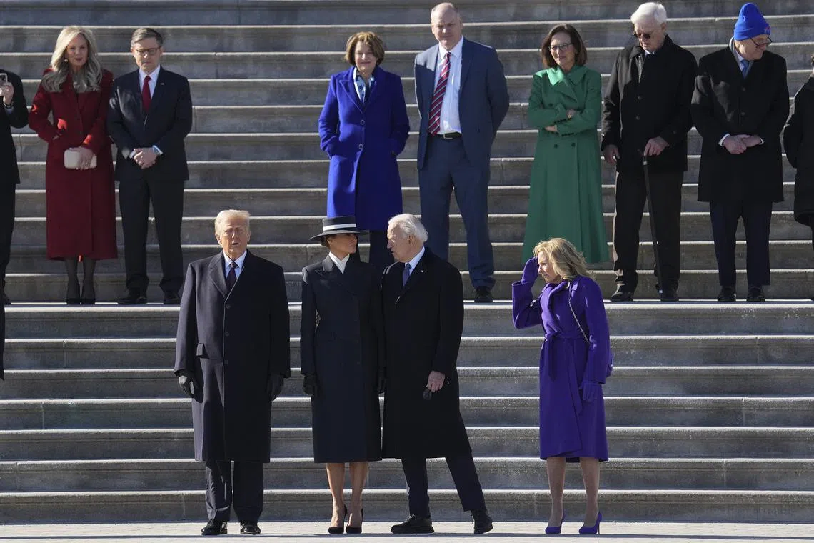 US President Donald Trump, First Lady Melania Trump, outgoing President Joe Biden and First Lady Dr. Jill Biden participating in the departure ceremony for the Bidens on the East Front of the United States Capitol on Jan 20, 2025. 