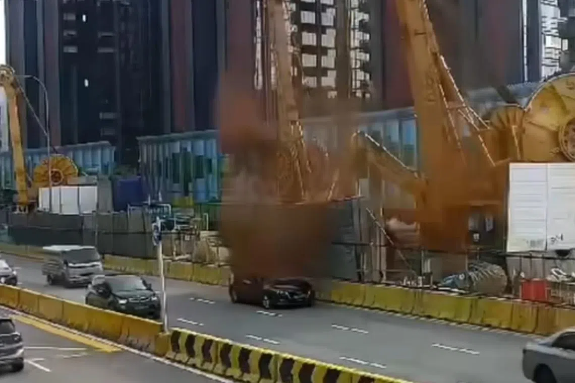 Footage posted to the SG Road Vigilante Facebook page showed the car drenched in mud when it drove past the construction site.