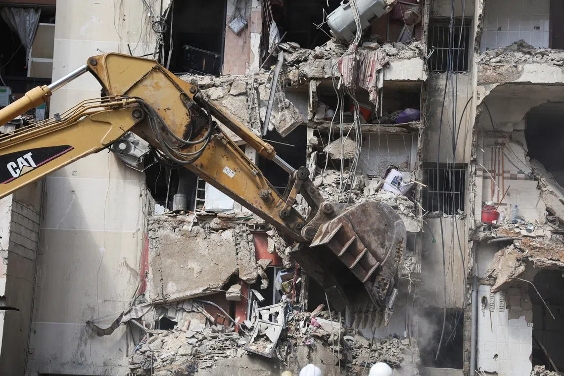 A view of a damaged building at the site of Friday's Israeli strike, as search and rescue operations continue, in Beirut's southern suburbs, Lebanon September 21, 2024. REUTERS/Amr Abdallah Dalsh