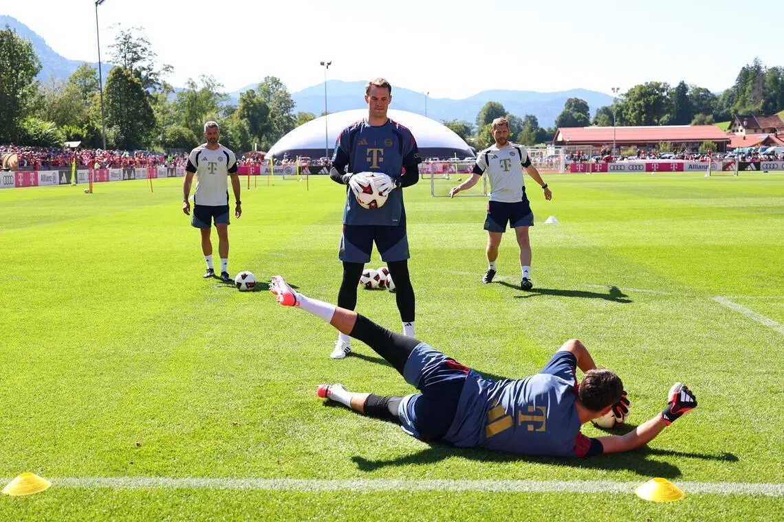 Goalkeeper Manuel Neuer (with ball) had signed a one-year contract extension in May.