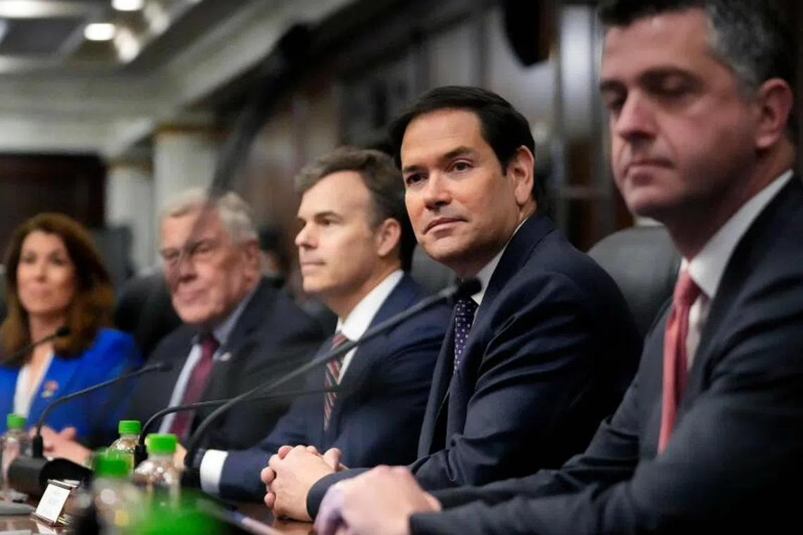 US Secretary of State Marco Rubio (2nd R) gestures during a meeting with Panama's President Jose Raul Mulino (not in frame), at the presidential palace in Panama City on February 2, 2025. Rubio arrived on the eve on his debut trip abroad as US secretary of state, as he looks for how to follow up on President Donald Trump's extraordinary threat to seize the Panama Canal. (Photo by Mark Schiefelbein / POOL / AFP)