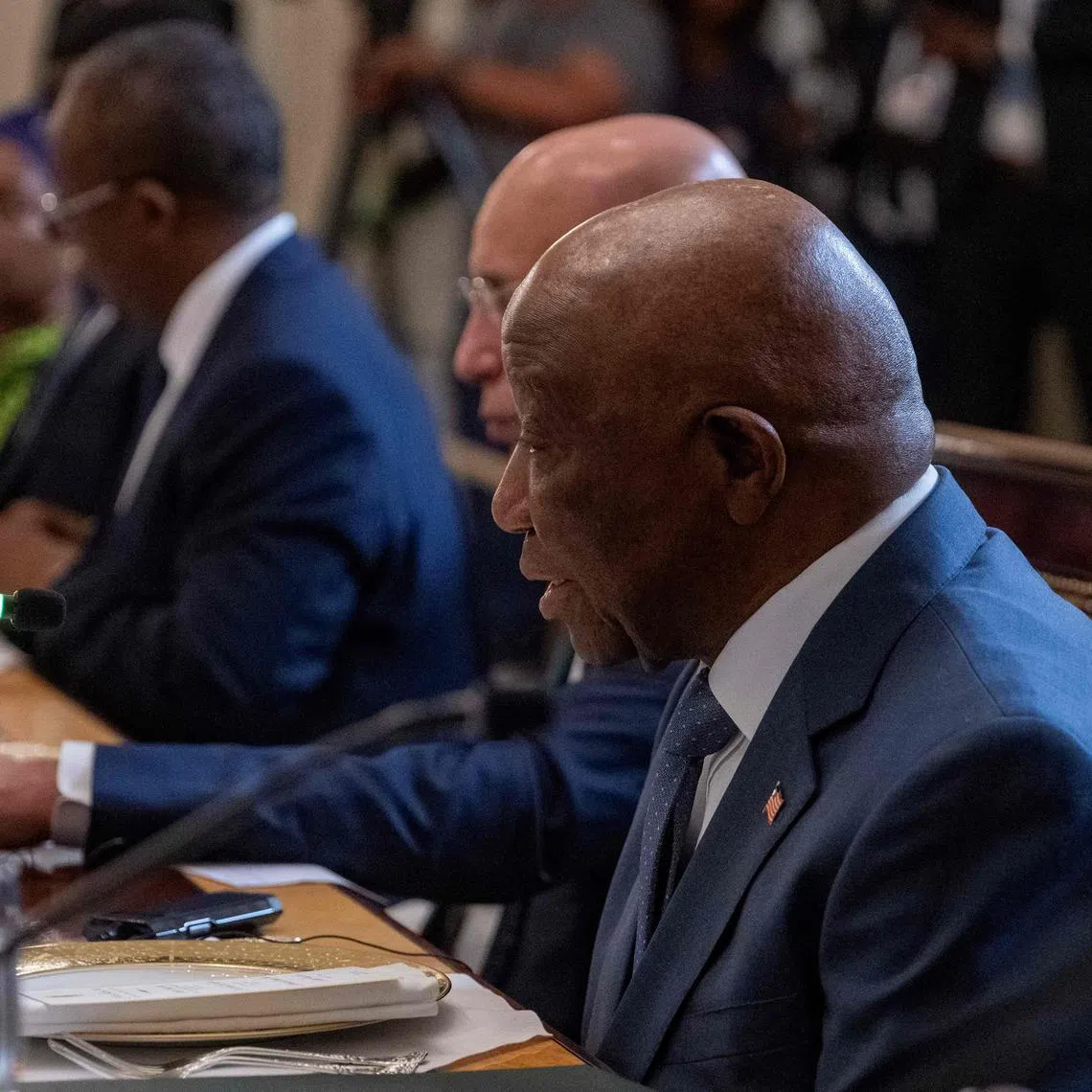 Liberian President Joseph Boakai (right) speaking during a lunch hosted by US President Donald Trump with African leaders at the White House on July 9.