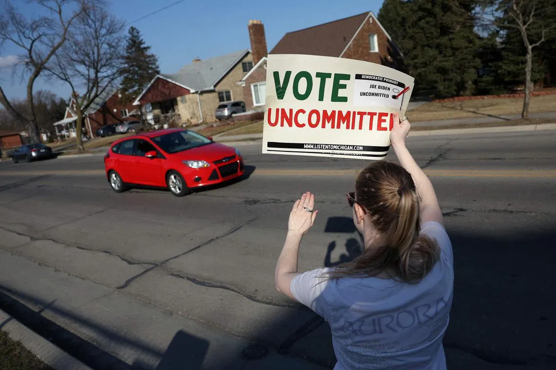 A Democratic voter uncommitted to US President Joe Biden rallying outside a polling station in Dearborn, Michigan, during the state's Democratic primary on Feb 27.