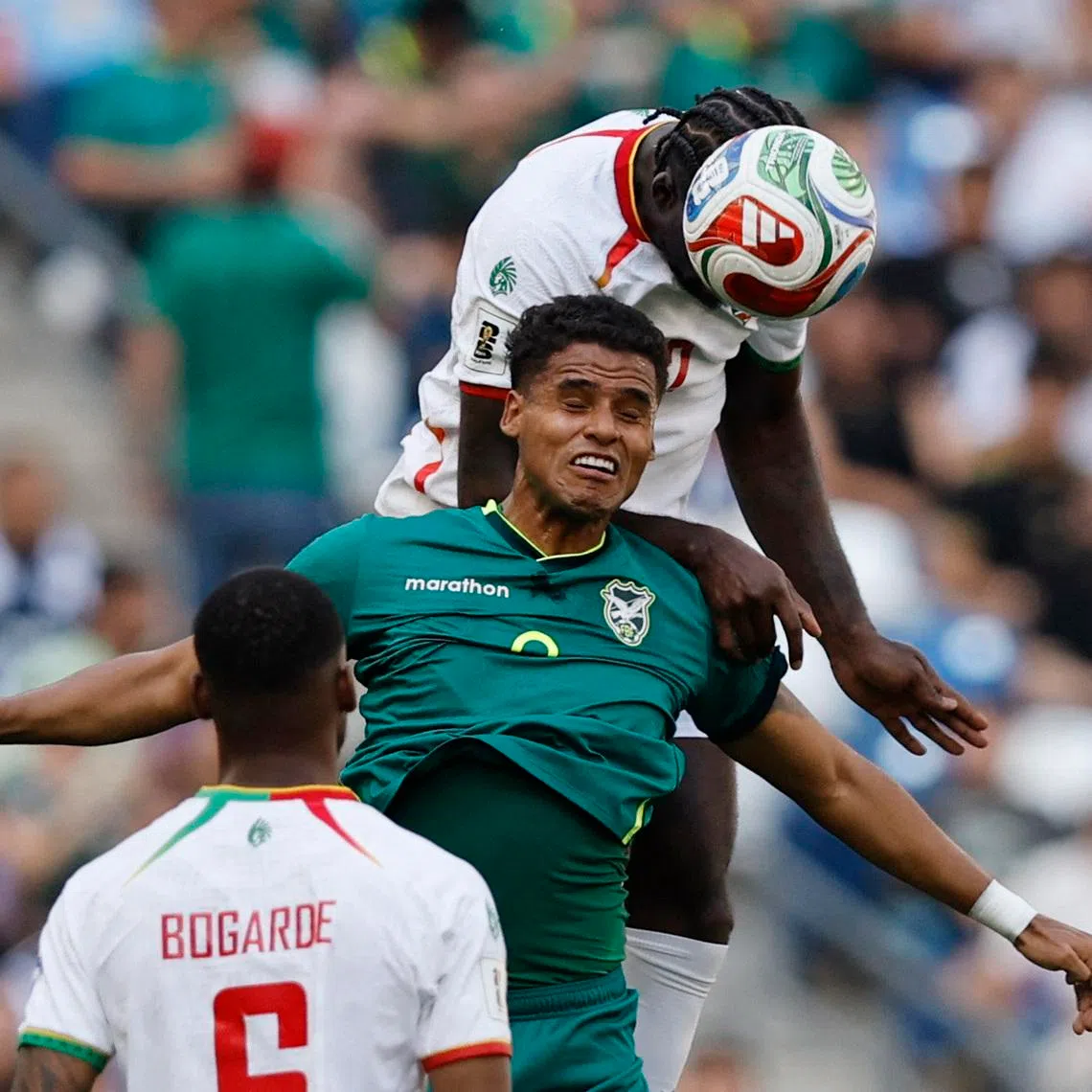 Soccer Football - FIFA World Cup - Inter-Confederation Playoffs - Semi Final - Bolivia v Suriname - Estadio BBVA, Monterrey, Mexico - March 26, 2026  Bolivia's Enzo Monteiro in action with Suriname's Myenty Abena REUTERS/Daniel Becerril