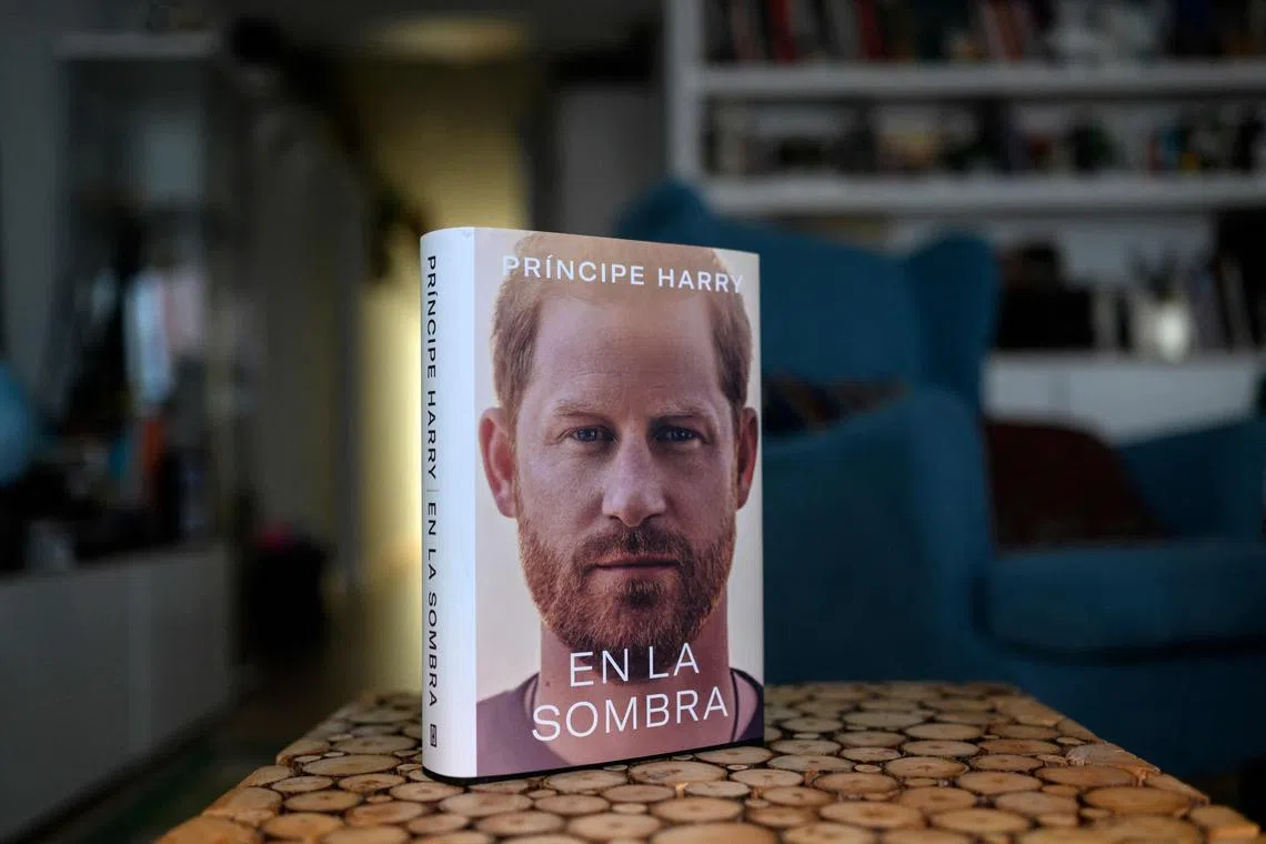 A copy of En La sombra (In The shadow), the Spanish version of Britain's Prince Harry's autobiography Spare, is pictured at a reader's home in Madrid on Jan 5, 2023, despite the publication date set at Jan 10 with stringent measures in place. 