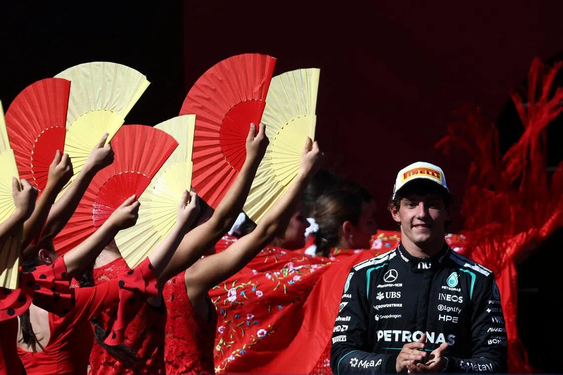 Mercedes’ Andrea Kimi Antonelli celebrates on the podium after winning the Spanish Grand Prix.