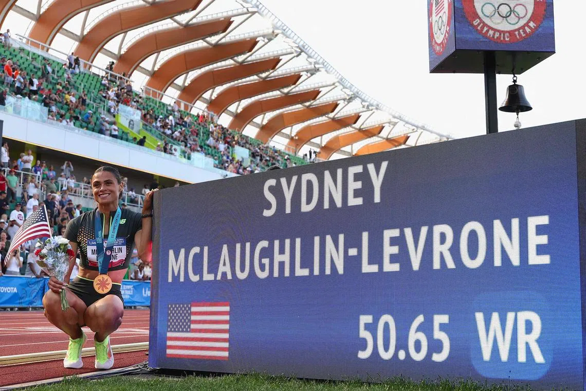 Sydney McLaughlin-Levrone posing with her new world record in the women's 400 metres hurdles at the US Olympic trials on June 30.