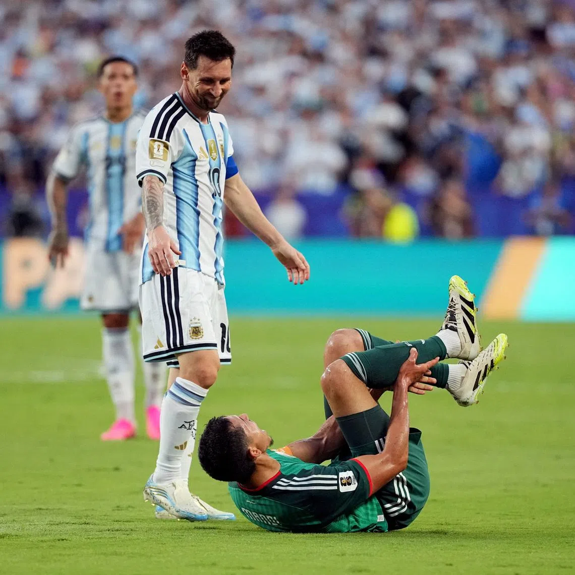 Soccer Football - FIFA World Cup 2026 - Group J - Argentina v Algeria - Kansas City Stadium, Kansas City, Missouri, U.S. - June 16, 2026 Algeria's Aissa Mandi reacts as Argentina's Lionel Messi looks on IMAGN IMAGES via Reuters/Denny Medley