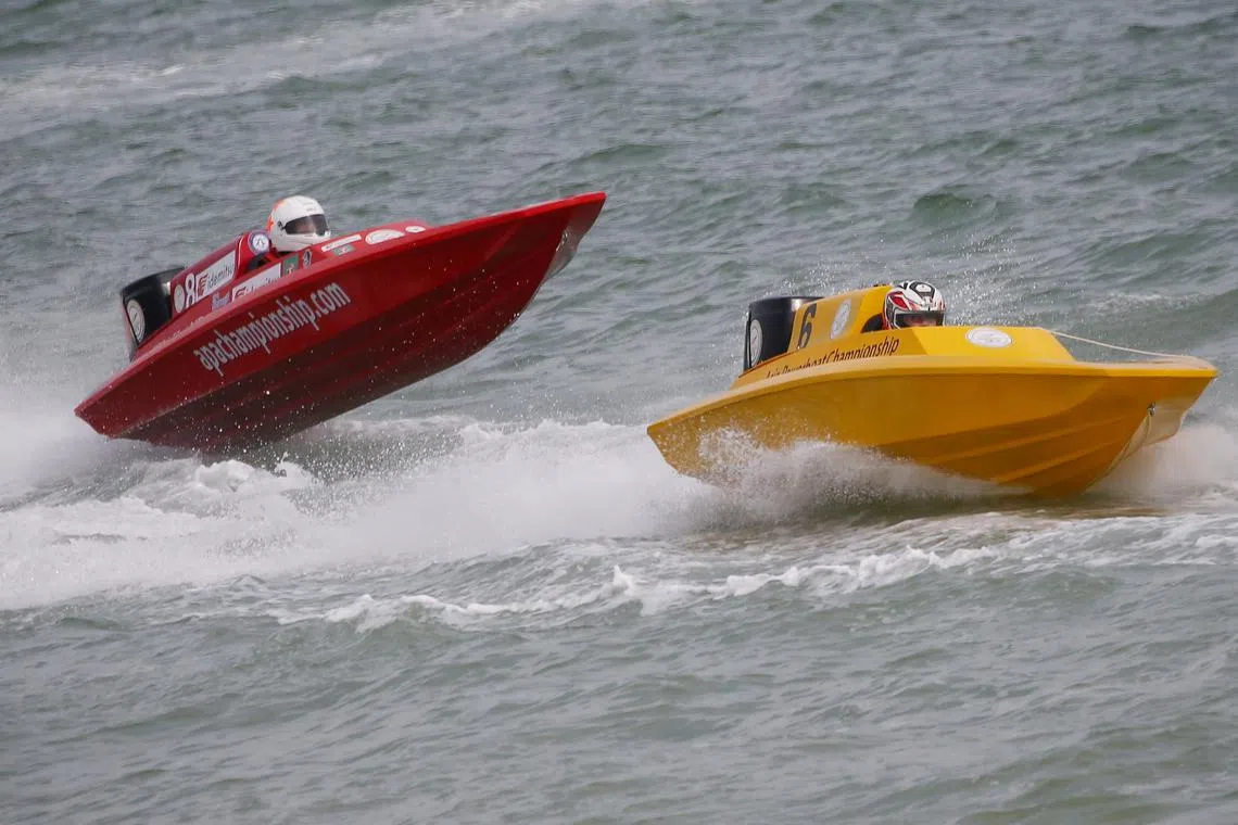 Loh Kai Ling (right) won the inaugural women's category of the Nov 4-6 Singapore Asia Powerboat Championship.
