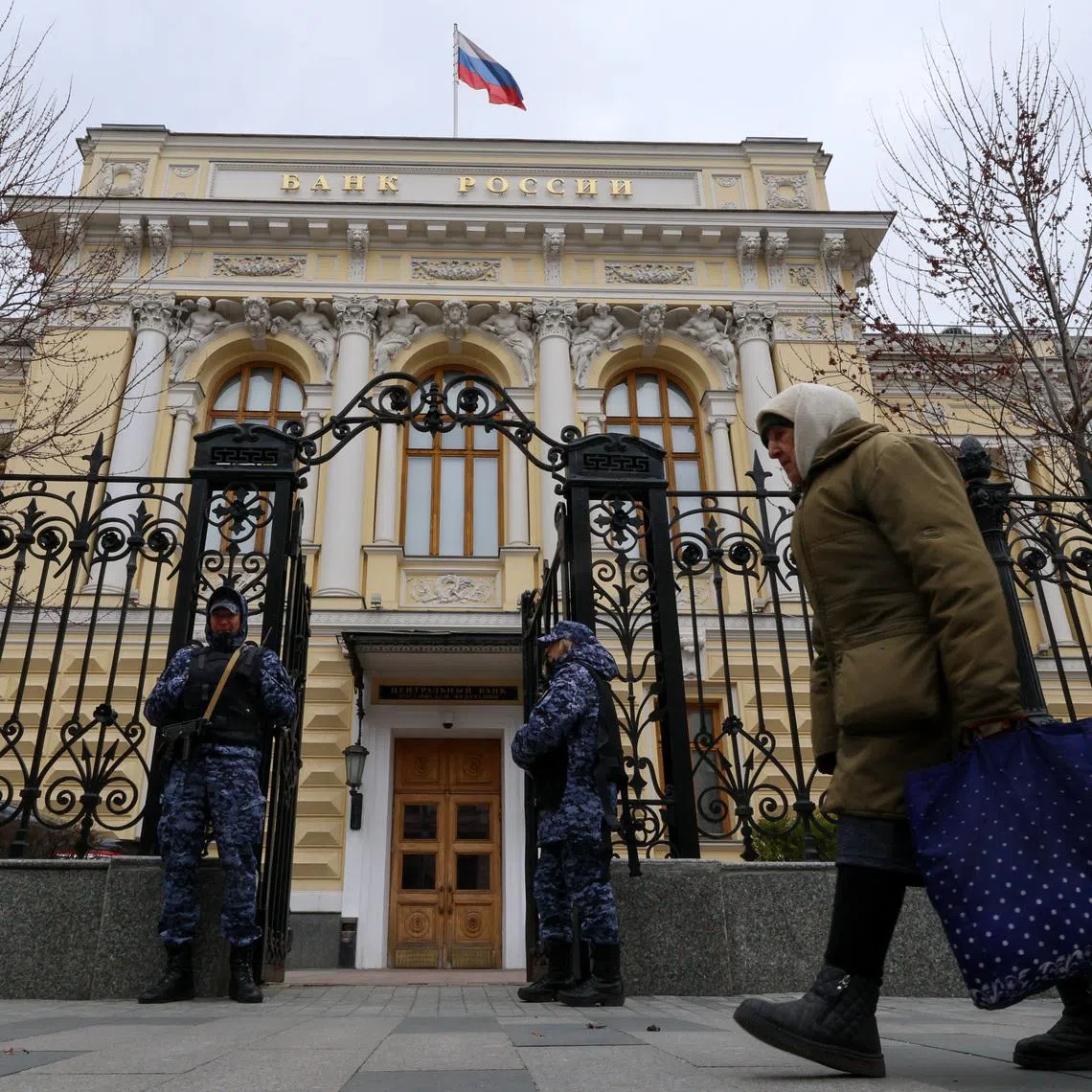 A flag flies above the headquarters of the Russian Central Bank on the day of a key rate-setting meeting in Moscow, Russia, April 24, 2026. REUTERS/Anastasia Barashkova