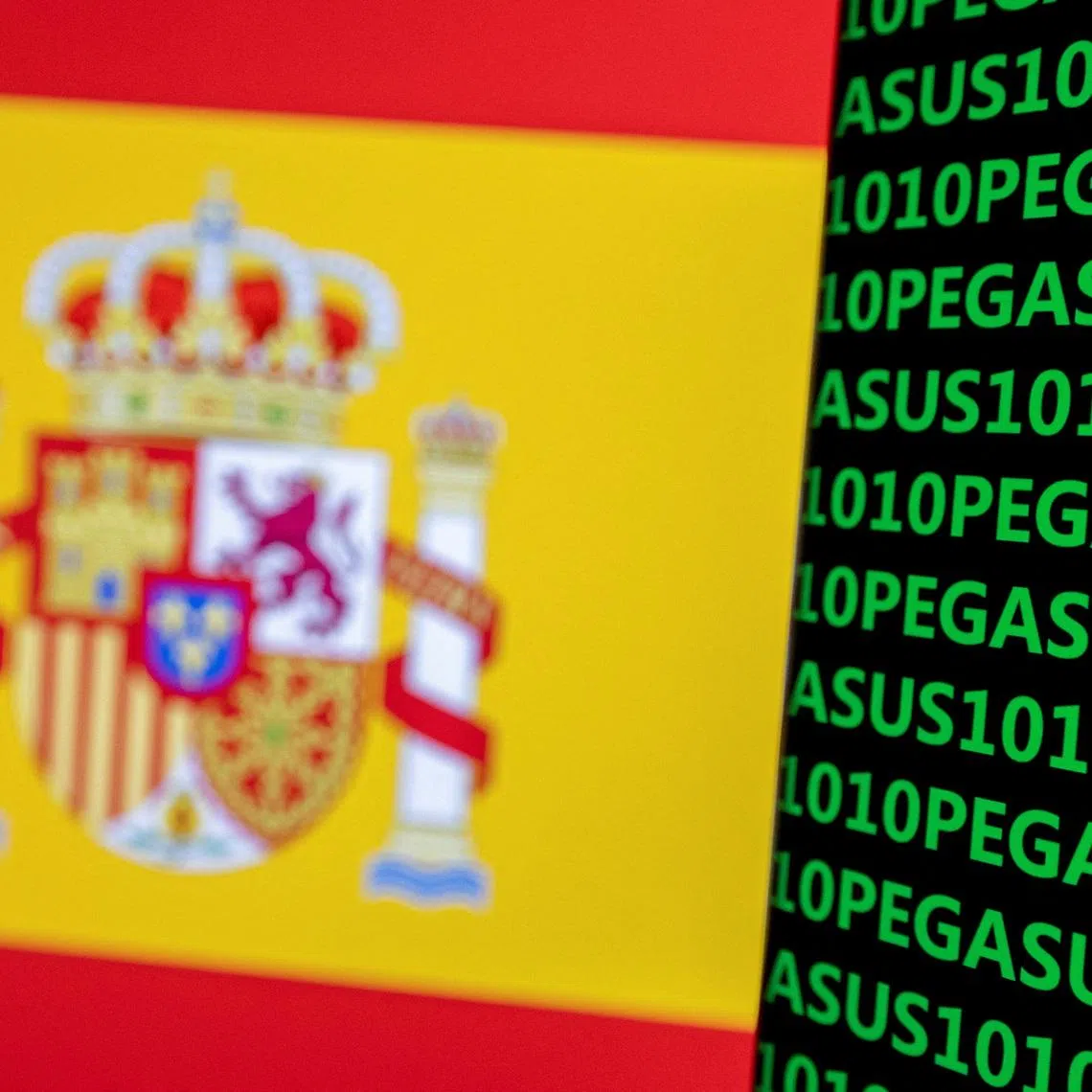 FILE PHOTO: The word Pegasus, binary code and the Spanish flag are seen in this illustration taken May 4, 2022. REUTERS/Dado Ruvic/Illustration/File Photo