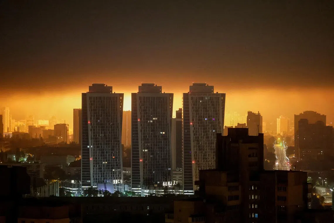 An explosion of a drone lights up the sky over the city during a Russian drone strike, amid Russia's attack on Ukraine, in Kyiv, Ukraine May 25, 2025. REUTERS/Gleb Garanich