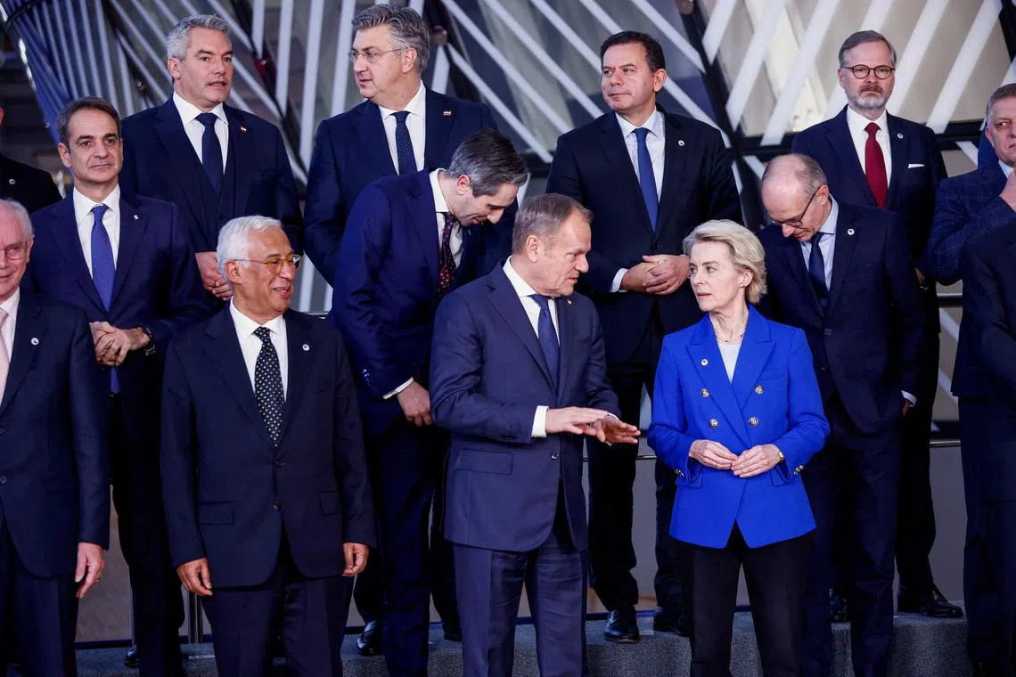 European leaders gathering for a family photo at a summit in Brussels on Dec 19.