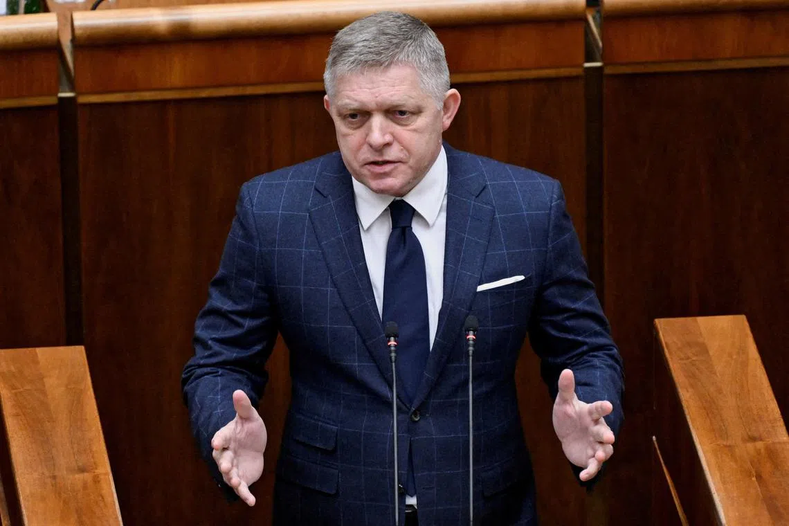 FILE PHOTO: Slovakia's Prime Minister Robert Fico attends a parliamentary session during a no-confidence vote against his government, in Bratislava, Slovakia, January 21, 2025. REUTERS/Radovan Stoklasa/File Photo