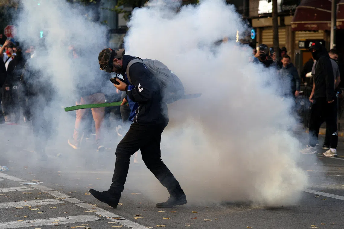 A demonstrator takes part in an anti-government protest held by Albanian students in Tirana, Albania, October 13, 2026. REUTERS/Florion Goga