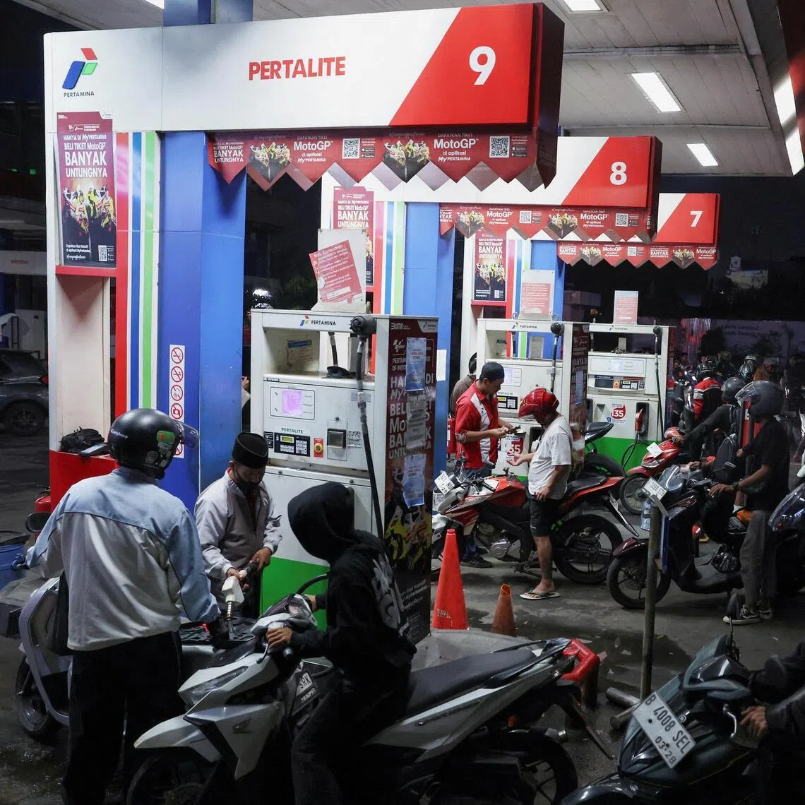 Across Riau, lines of motorcycles, trucks and cars have formed at nearly every gas station.