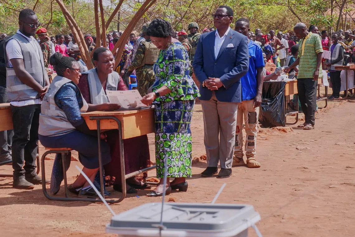 FILE PHOTO: Malawian President Lazarus Chakwera waits to vote in the country's general election at Malembo village, west of the capital, Lilongwe, Malawi September 16, 2025. REUTERS/Eldson Chagara/ File Photo