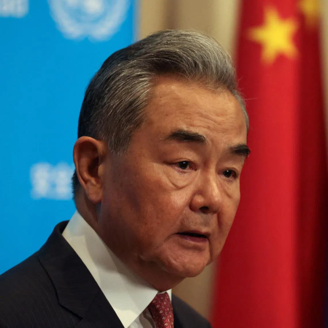 FILE PHOTO: Chinese Foreign Minister Wang Yi speaks with the media at the U.N. headquarters in New York City, U.S., May 26, 2026. REUTERS/Shannon Stapleton/File Photo