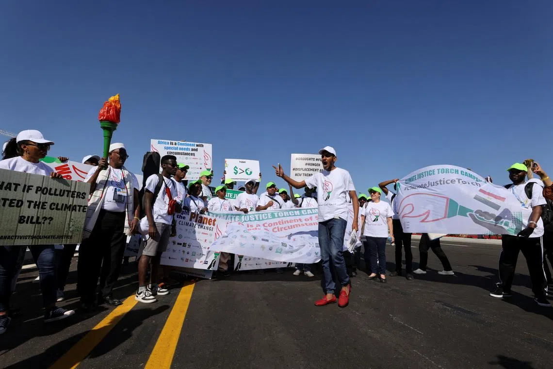 Civil society group "The COP 27 Coalition" holding a march during the COP27 climate summit, on a day of action for climate justice, in Sharm el-Sheikh, Egypt, on Saturday.