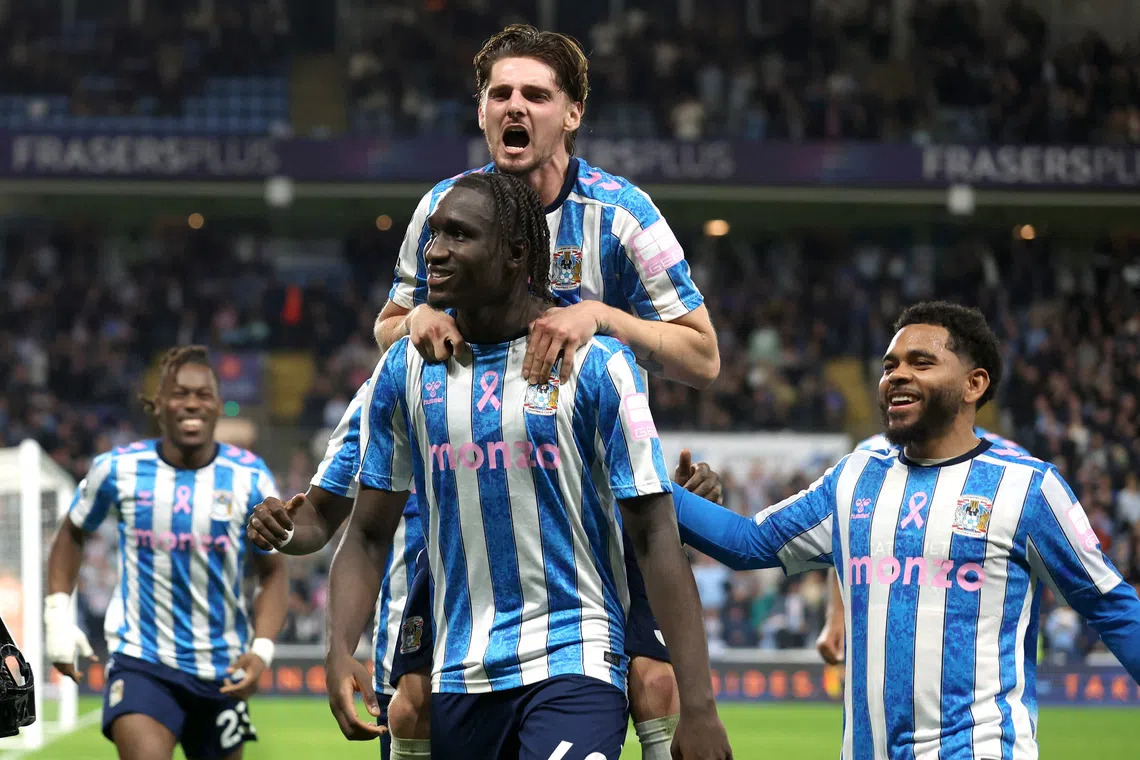 Coventry City’s Sidiki Cherif celebrates scoring their second goal against Newcastle United with Jack Rudoni on Oct 12.