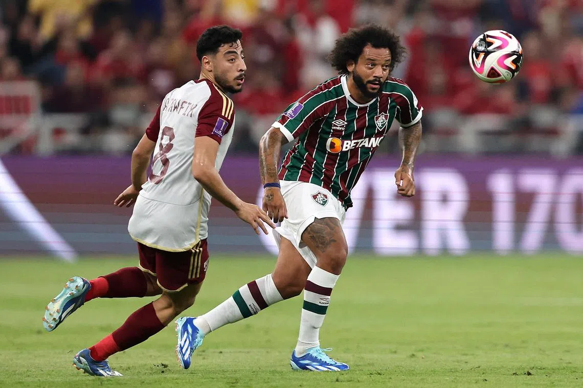 Fluminense's Marcelo (right) in action with Al-Ahly's Akram Tawfik during the Club World Cup semi-final in the King Abdullah Sports City, Jeddah, Saudi Arabia.