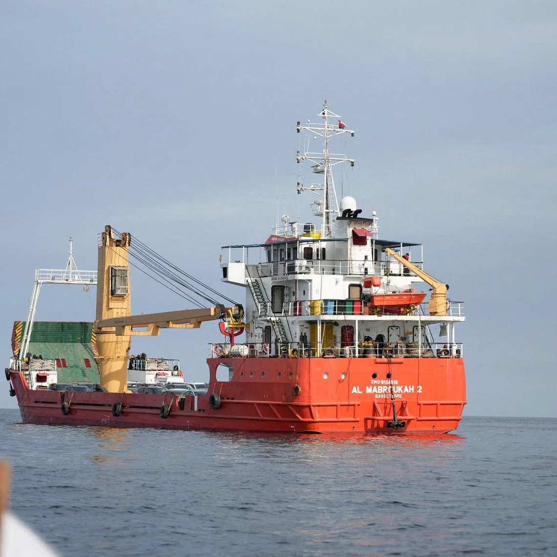 FILE PHOTO: A vessel at the Strait of Hormuz, off the coast of Oman’s Musandam province, April 12, 2026. REUTERS/File Photo