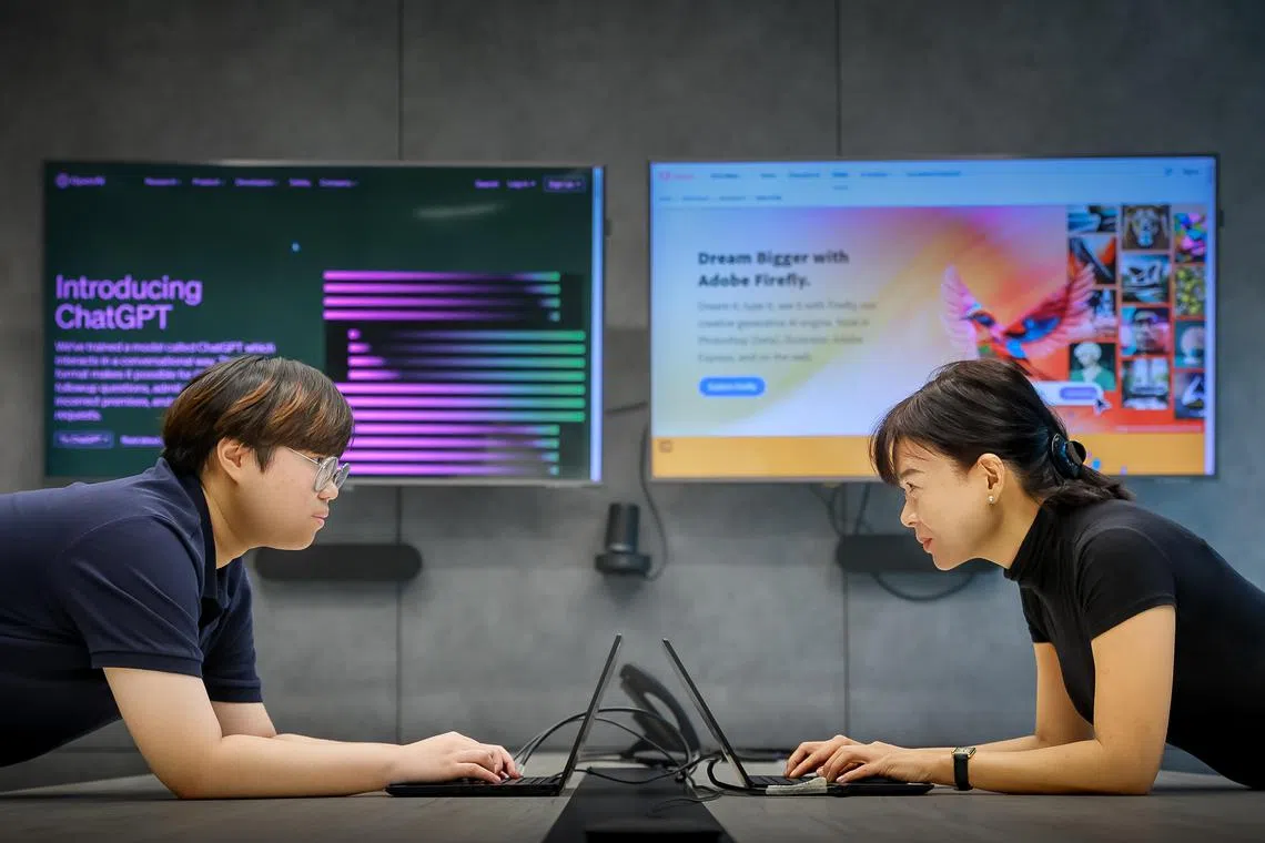 AI showdown.  A generative-assisted AI assignment brought forth different strengths of two journalists aged three decades apart: Clay Lim, 20, and Krist Boo, 50.  


The Straits Times Senior Correspondent Krist Boo (right) and reporter Clay Lim (left) using AI tools ChatGPT and Adobe Firefly in the newsroom, June 13, 2023.