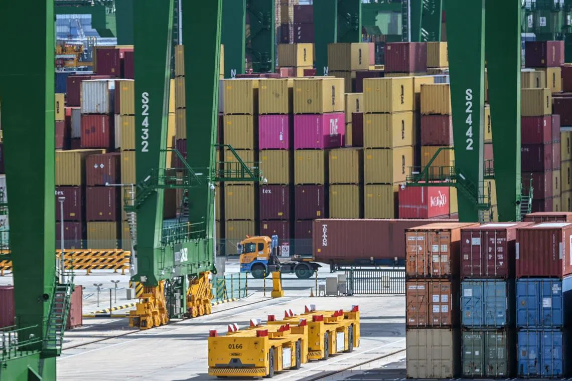 A general view shows stacks of containers at PSA Tuas Port terminal in Singapore on May 27, 2024. (Photo by Roslan RAHMAN / AFP)