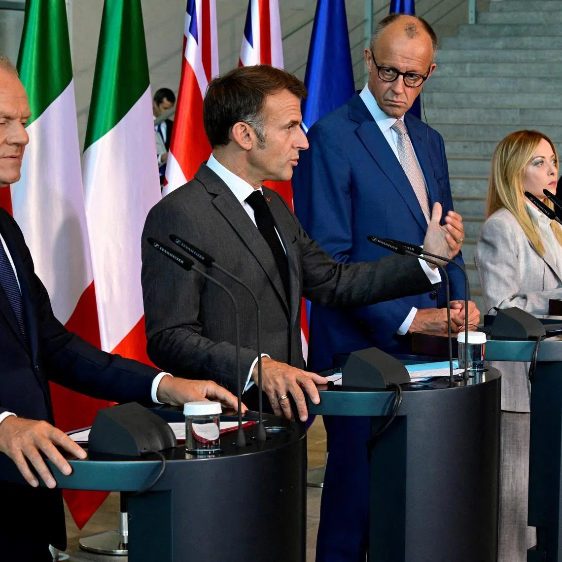 Poland's Prime Minister Donald Tusk, France's President Emmanuel Macron, German Chancellor Friedrich Merz, Italy's Prime Minister Giorgia Meloni and Britain's Prime Minister Keir Starmer address the press at the end of their meeting of state leaders of the European Group of Five (E5)at the Chancellery in Berlin, Germany, June 24, 2026  JOHN MACDOUGALL/Pool via REUTERS