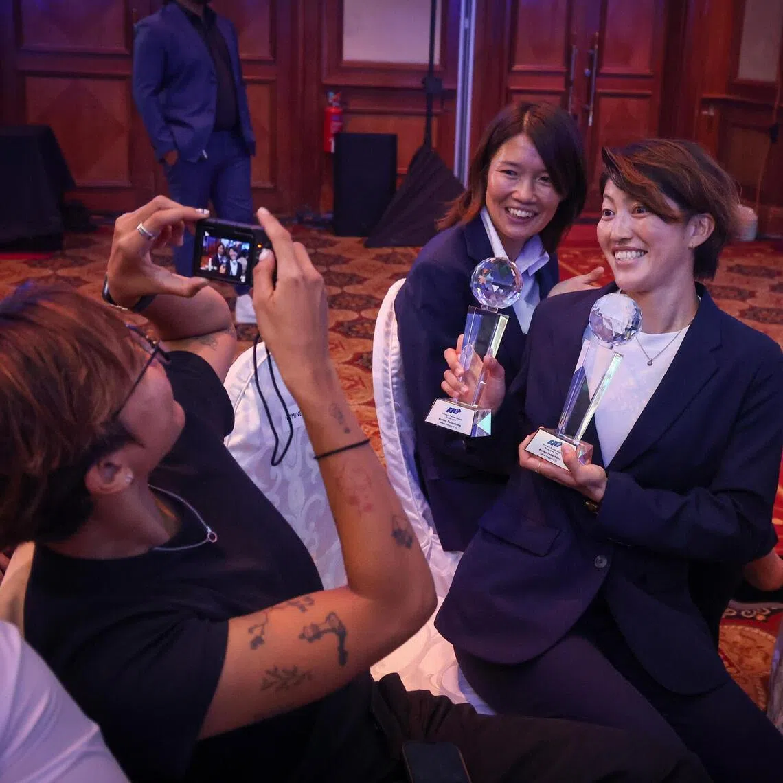 ST20260117_202647600627/jcawards17/Jason Quah

Women’s Premier League (WPL) Player of the year and Golden Boot winner Ruriko Takashima posing for a photo with player-coach Kana Kitahara at the Amateur Leagues Awards Night on Jan 17, 2026. ST PHOTO: JASON QUAH